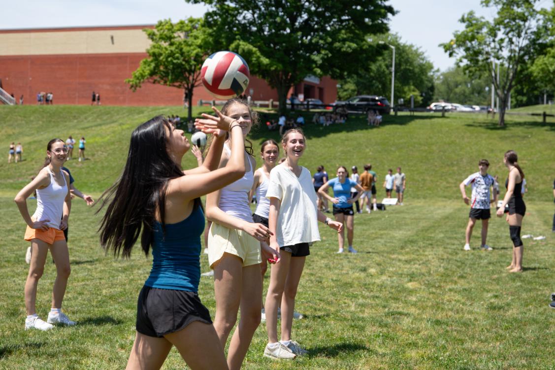 Students play volleyball at one of the outdoor stations on Field Day, Thursday, June 4.